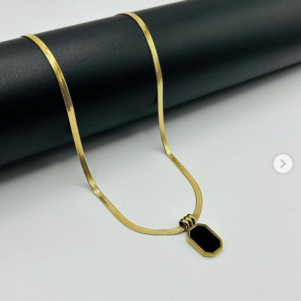 Gold Pendant Necklace with Black Enamel Charm